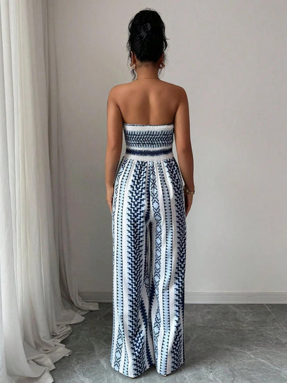 👗 JETZT 50% RABATT!💥Geometrischer Jumpsuit mit Neckholder & Seitenschlitz – Einzigartiger Print & Elastischer Rücken – Vielseitig, perfekt für Sommerpartys oder als Resort Wear ✨