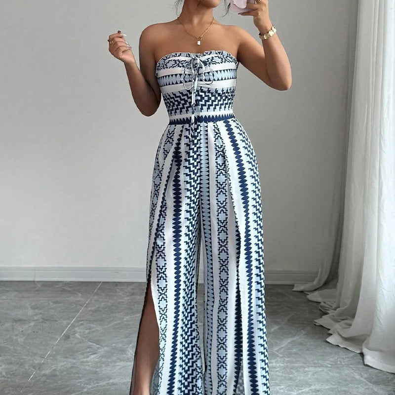 👗 JETZT 50% RABATT!💥Geometrischer Jumpsuit mit Neckholder & Seitenschlitz – Einzigartiger Print & Elastischer Rücken – Vielseitig, perfekt für Sommerpartys oder als Resort Wear ✨