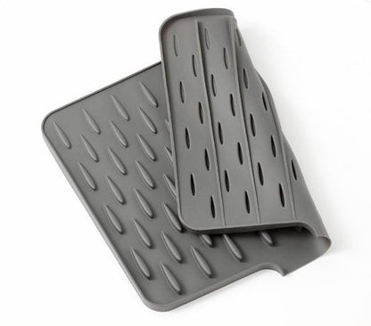 🍽️ 60% OFF NOW! ✨ No-Spill Silicone Worktop Saver - Heat-Resistant & Non-Slip Drying Mat with Drainage Groove 💧🧽
